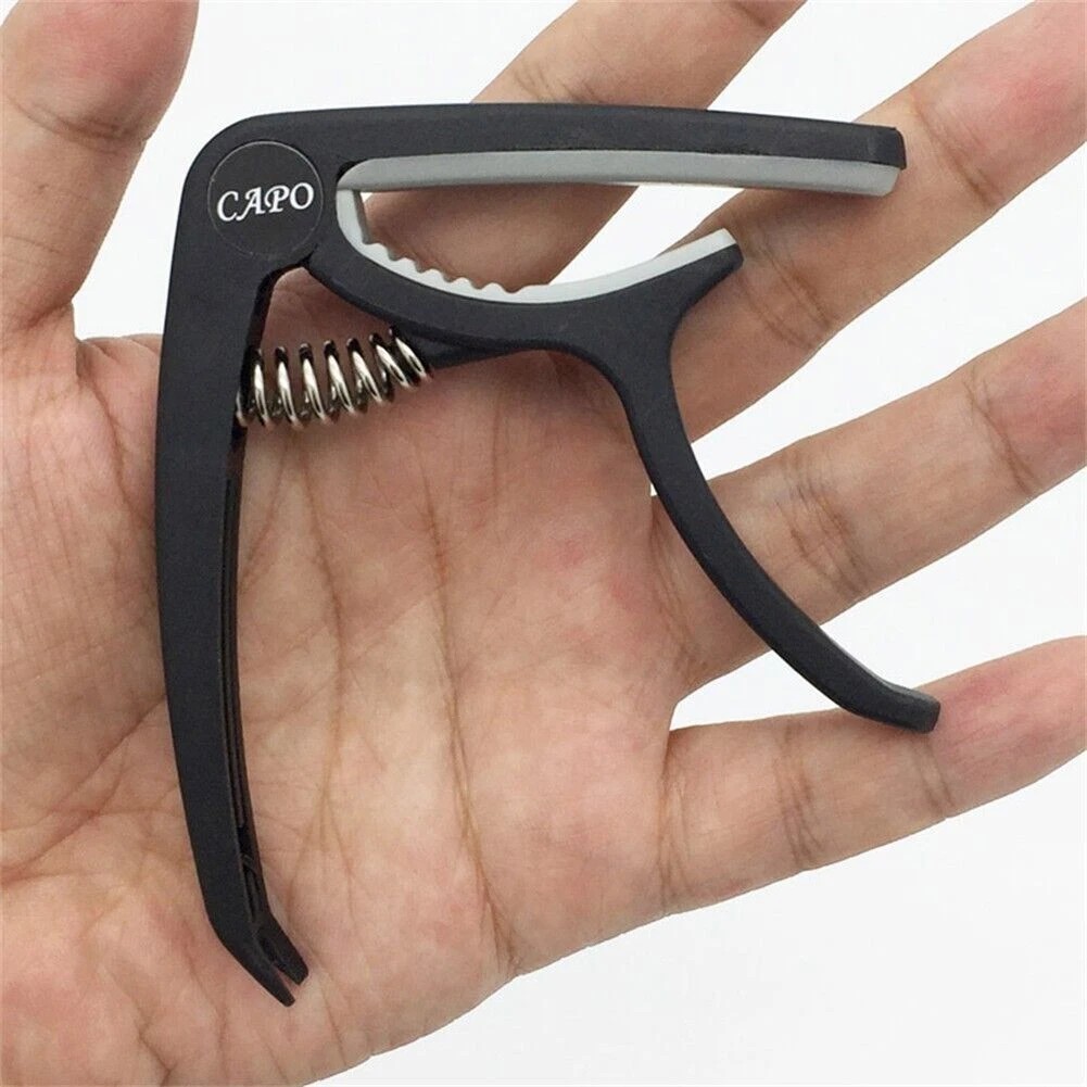 Универсальный гитарный каподас – обзор и цена Guitar Capo Clip