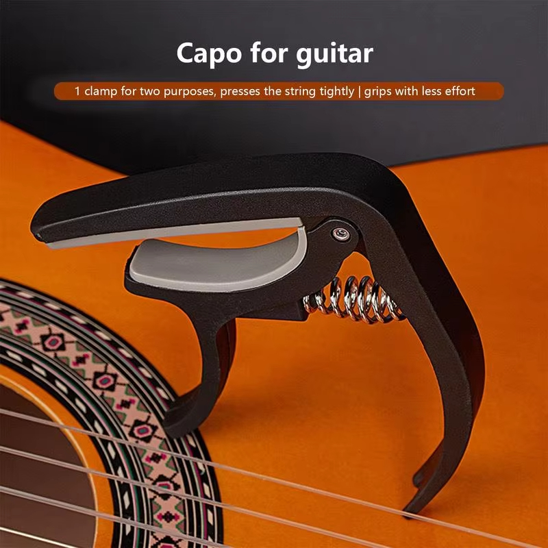Портативный пластиковый капо д – обзор и цена Guitar Capo Clip