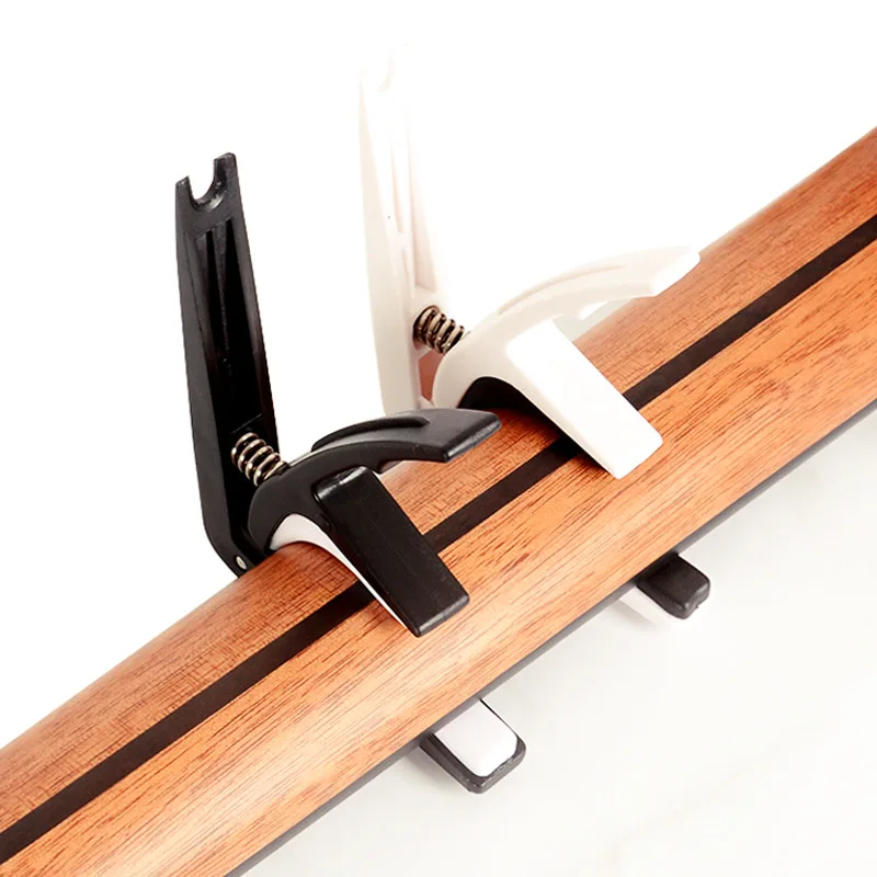 Универсальный гитарный каподас – обзор и цена Guitar Capo Clip